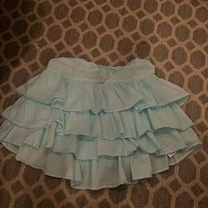 Mini light blue ruffle skirt